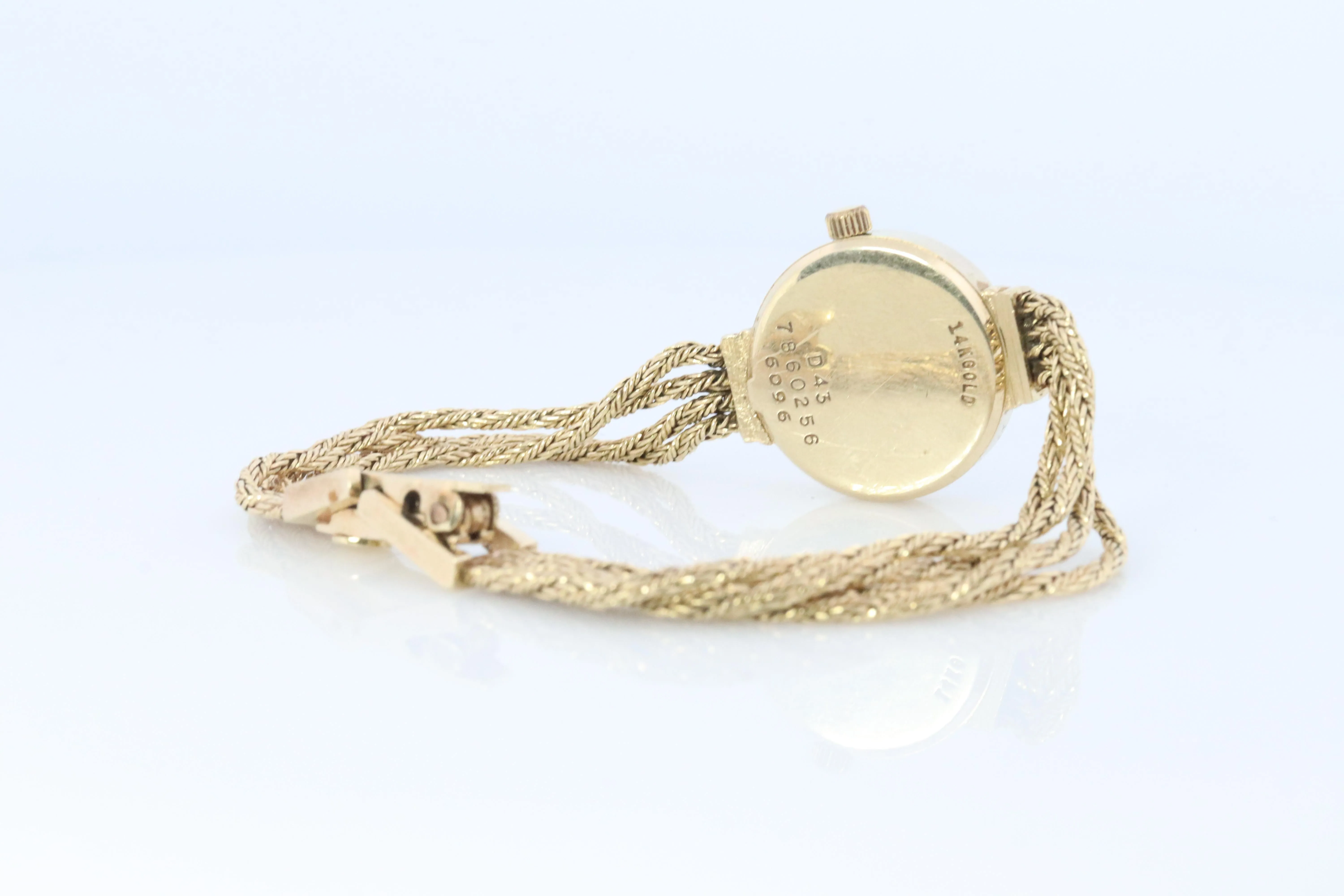 14k MOVADO Watch. 14k Yellow Gold Ladies Movado Rope Bracelet D43 Wristwatch