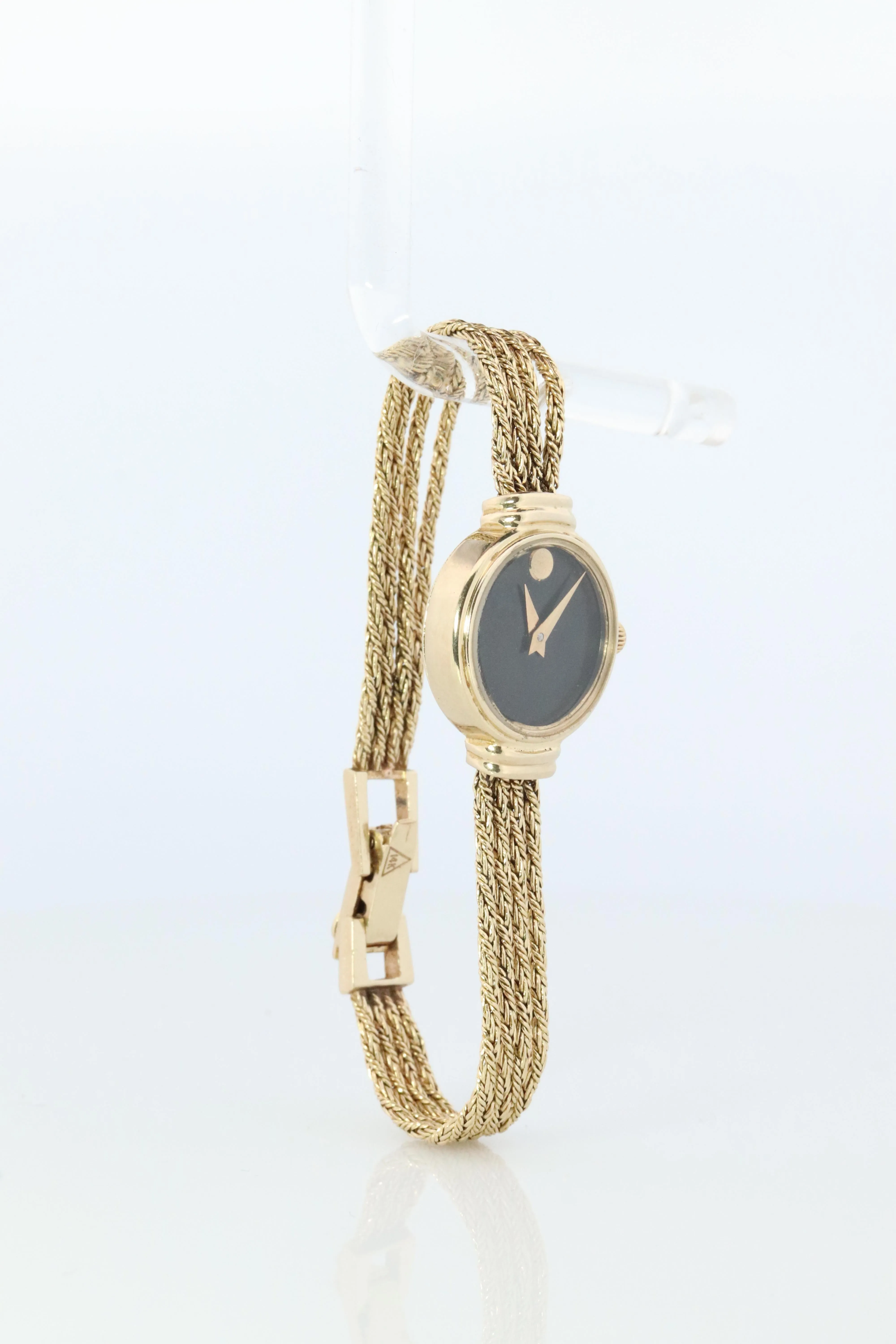 14k MOVADO Watch. 14k Yellow Gold Ladies Movado Rope Bracelet D43 Wristwatch
