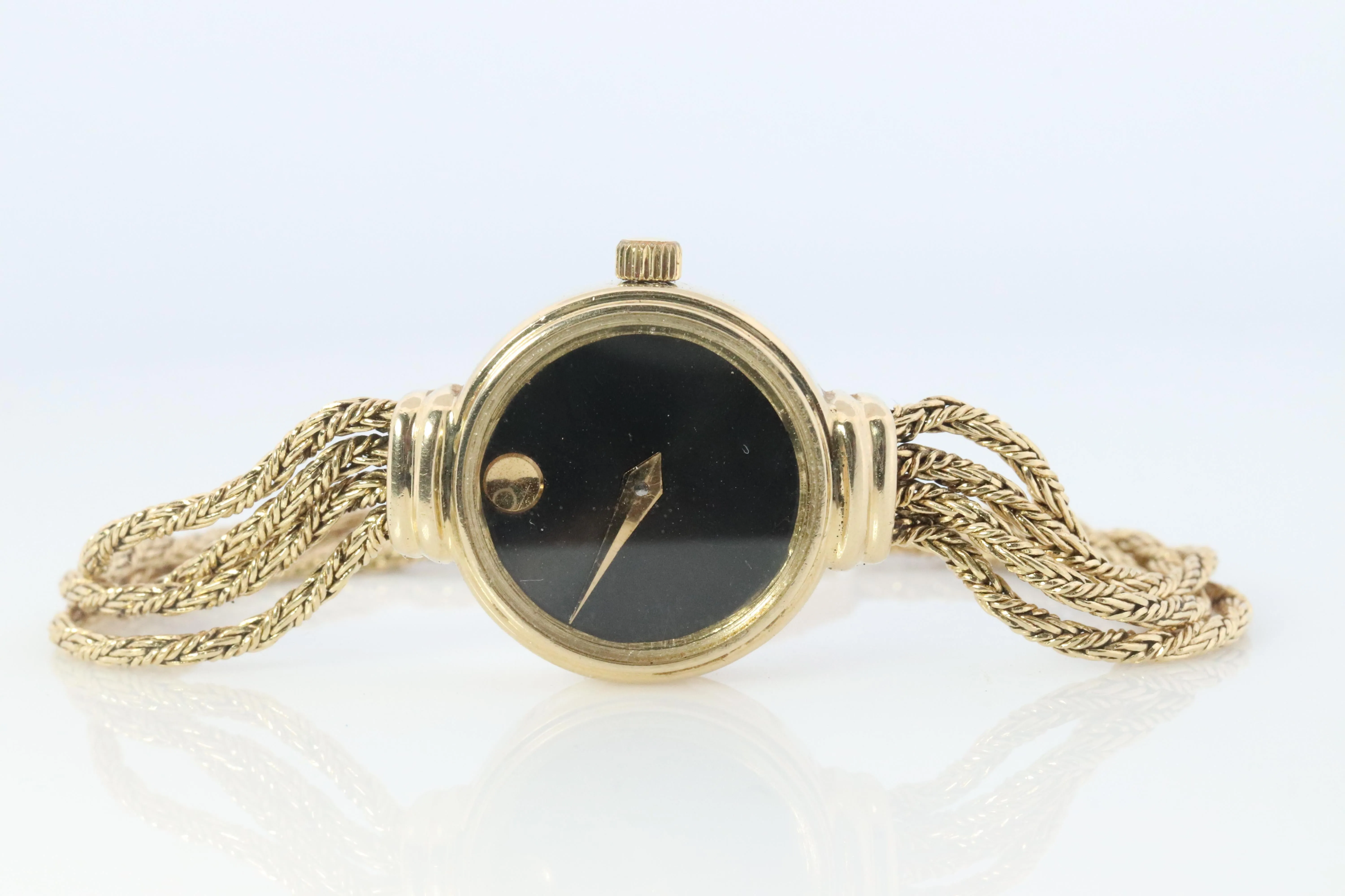 14k MOVADO Watch. 14k Yellow Gold Ladies Movado Rope Bracelet D43 Wristwatch