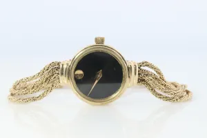 14k MOVADO Watch. 14k Yellow Gold Ladies Movado Rope Bracelet D43 Wristwatch