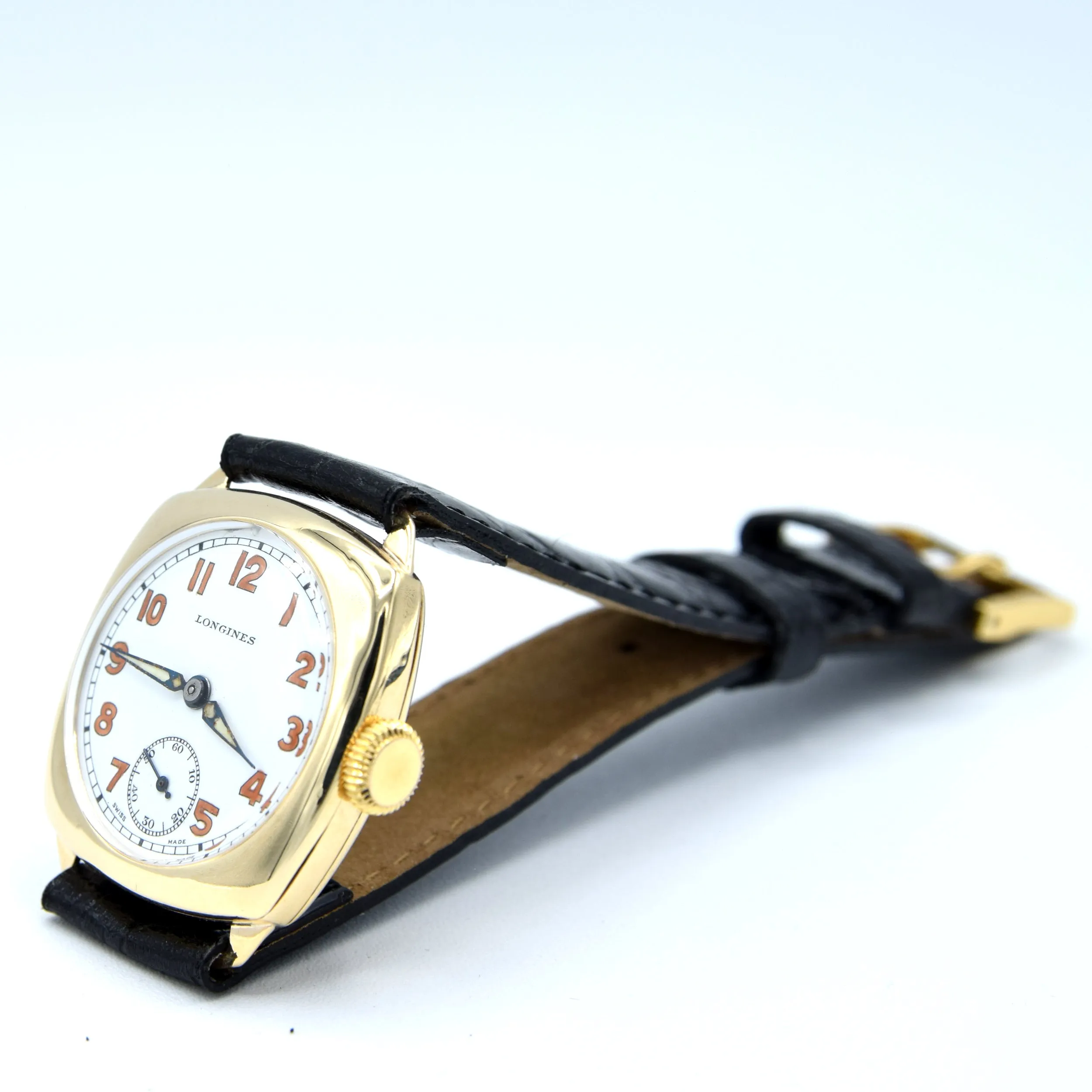 1942 Classic elegant Longines solid 9ct gold cushion Watch with Enamel Dial and Arabic Numerals