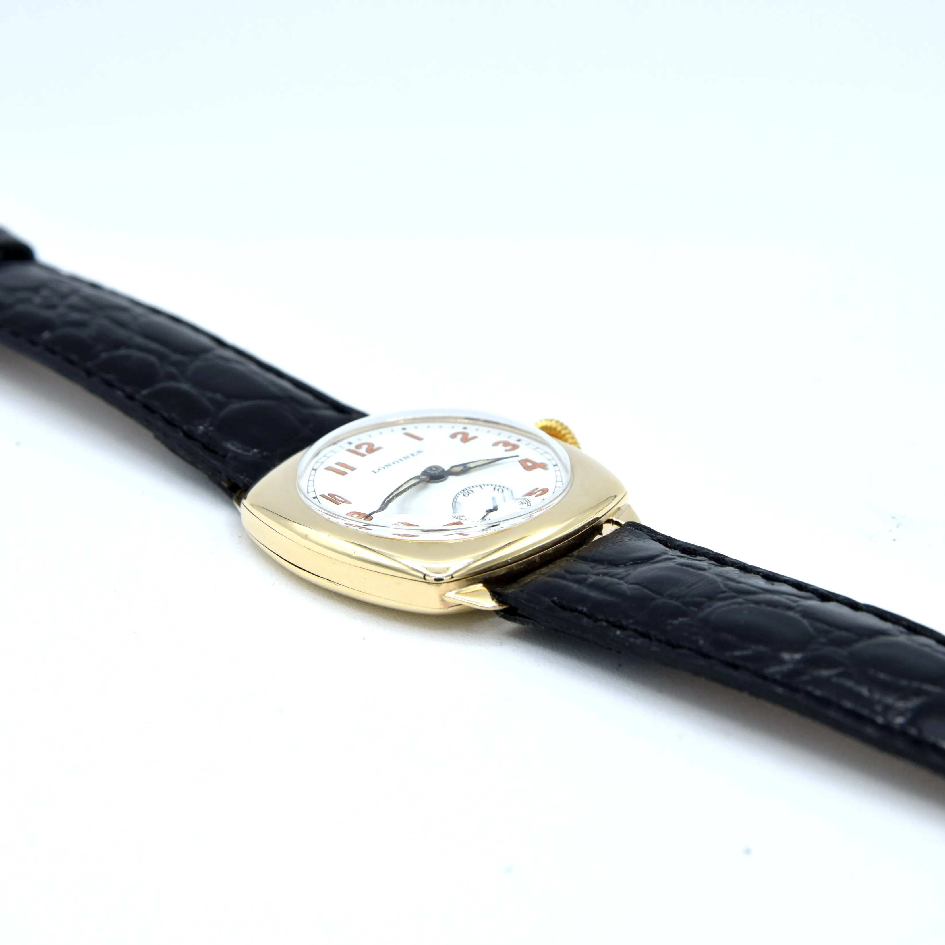 1942 Classic elegant Longines solid 9ct gold cushion Watch with Enamel Dial and Arabic Numerals