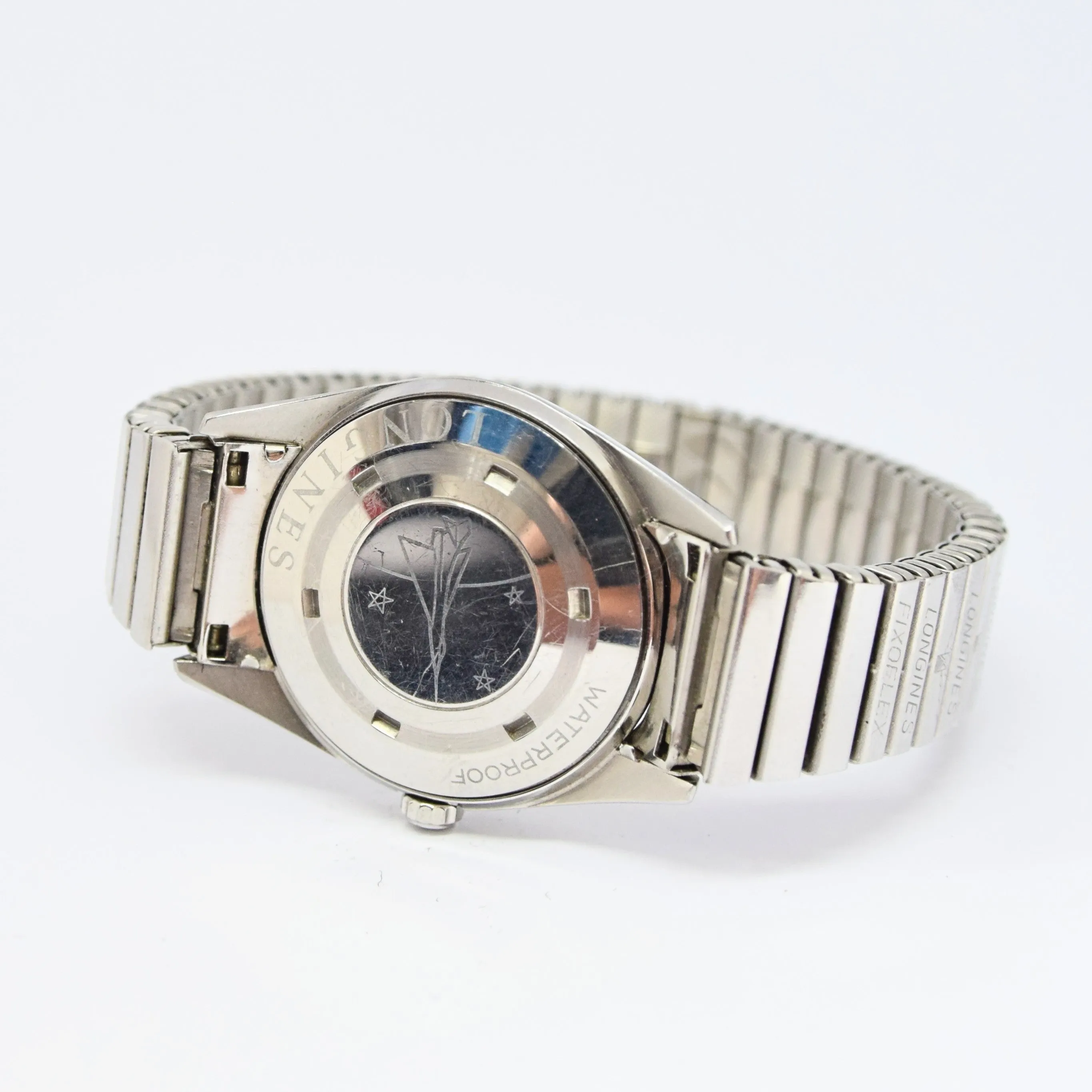 1957 Longines Silver Arrow Manual Wind in Stainless Steel on Rare Longines Fixoflex Bracelet Model 9100 & Archive Extract