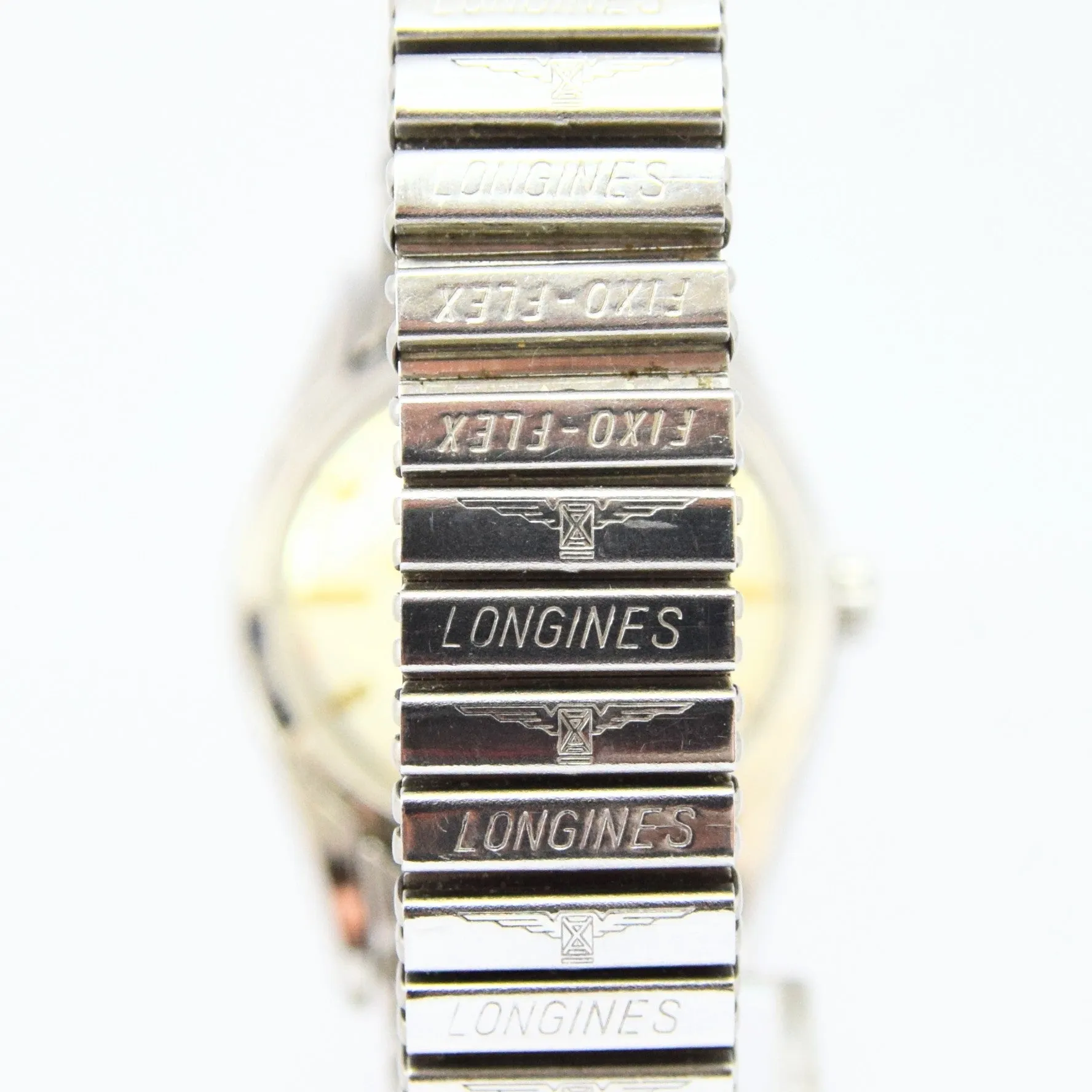 1957 Longines Silver Arrow Manual Wind in Stainless Steel on Rare Longines Fixoflex Bracelet Model 9100 & Archive Extract