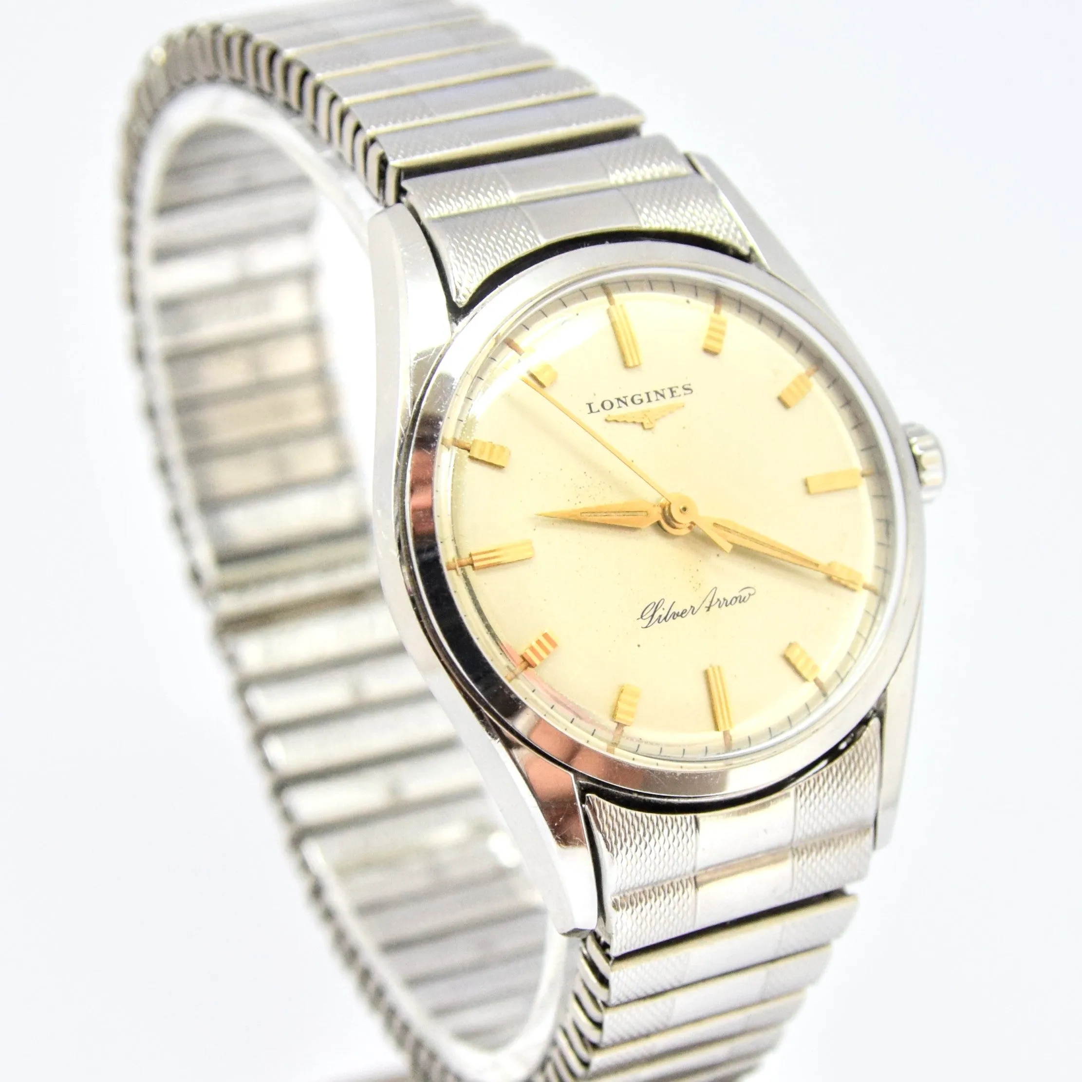 1957 Longines Silver Arrow Manual Wind in Stainless Steel on Rare Longines Fixoflex Bracelet Model 9100 & Archive Extract