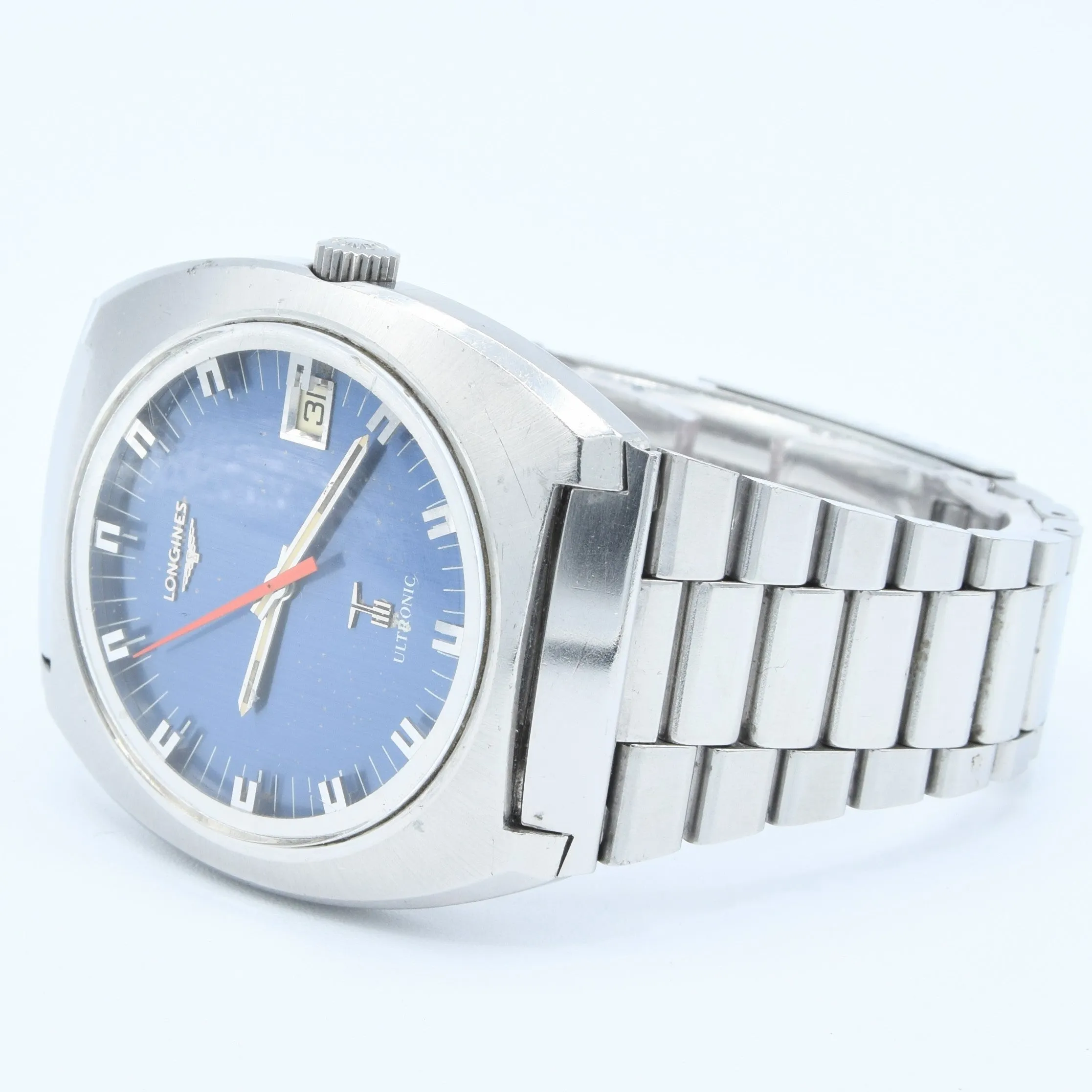 1976 Longines Large Ultronic Date Tonneau Wristwatch with Electric Blue Dial Model 8479 in Stainless Steel Case on Bracelet with Box