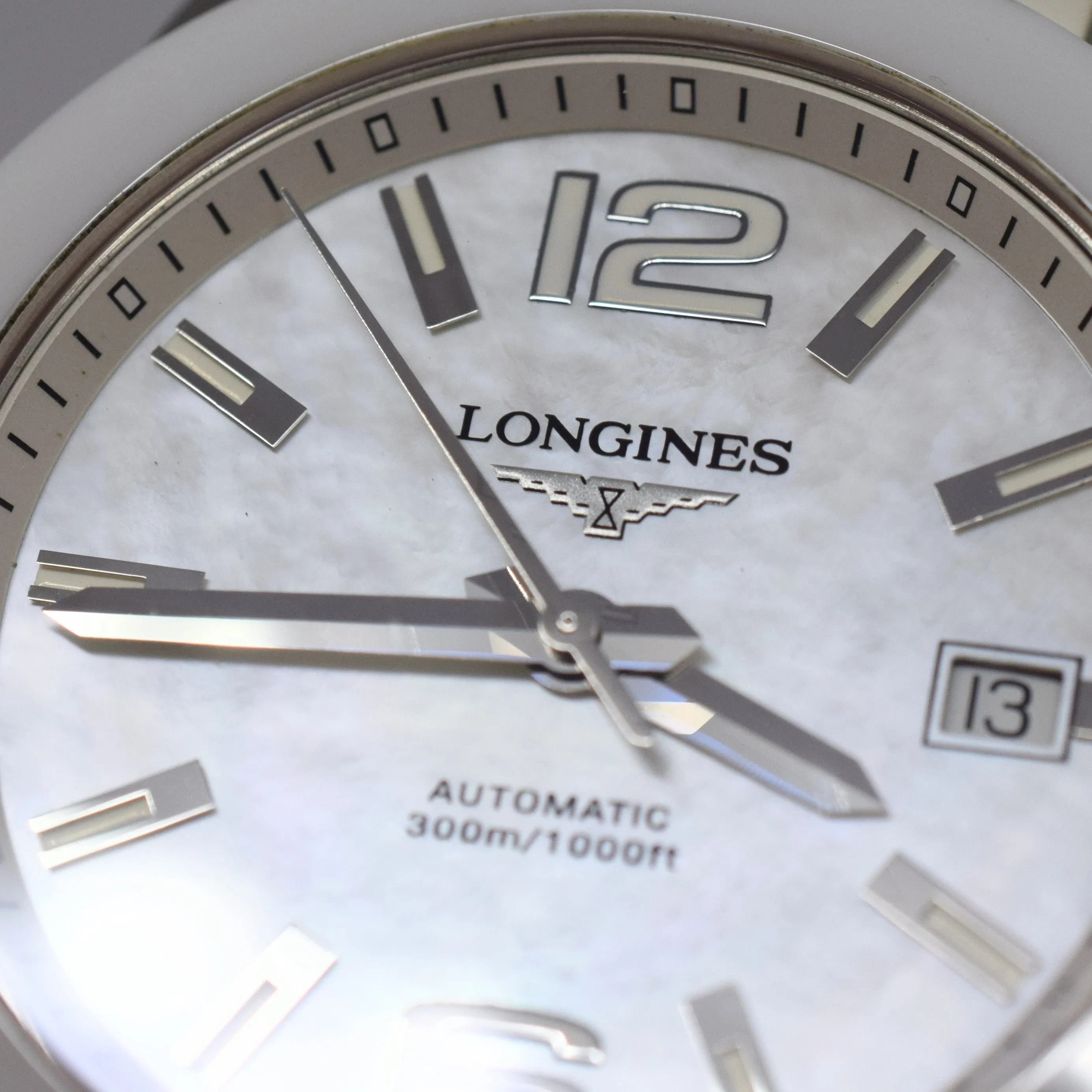 Longines Conquest Automatic Watch Model L36554862 in 39mm with MOP Dial - Stainless Steel & Ceramic Case with Box