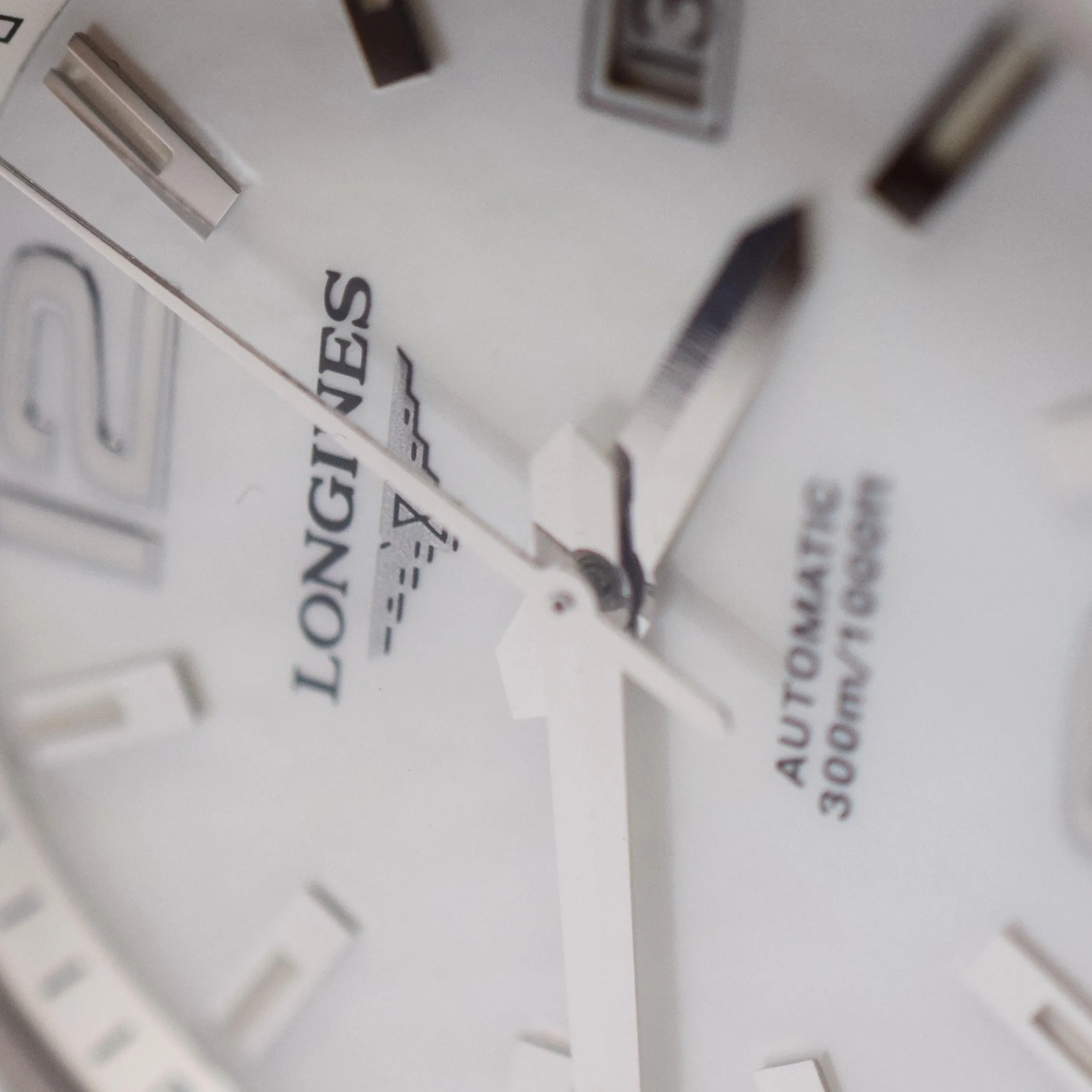 Longines Conquest Automatic Watch Model L36554862 in 39mm with MOP Dial - Stainless Steel & Ceramic Case with Box